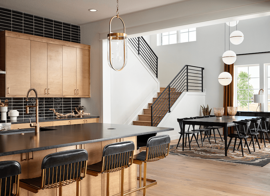 Dining room and kitchen in DTJ Design's luxury production home, 6150 at Westerly