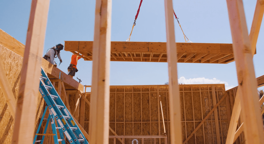 Lowering prefab panels into place on the Agorus and Hallmark Communities' Daybreak project