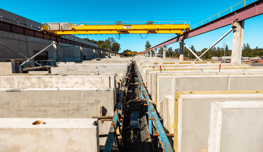 Off-site built concrete panels are ready for transport to the jobsite.