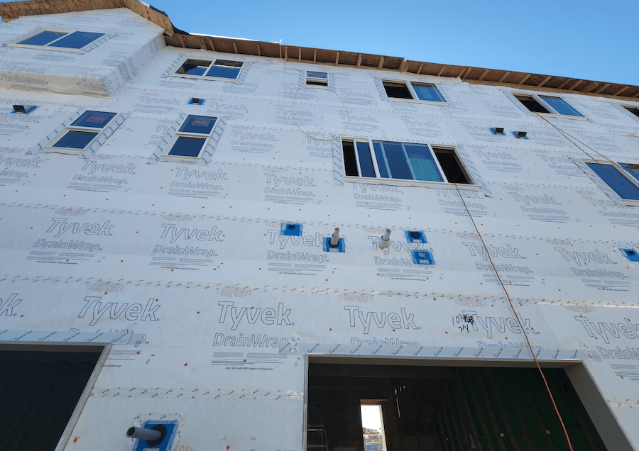 Unperforated housewrap installed on a home exterior