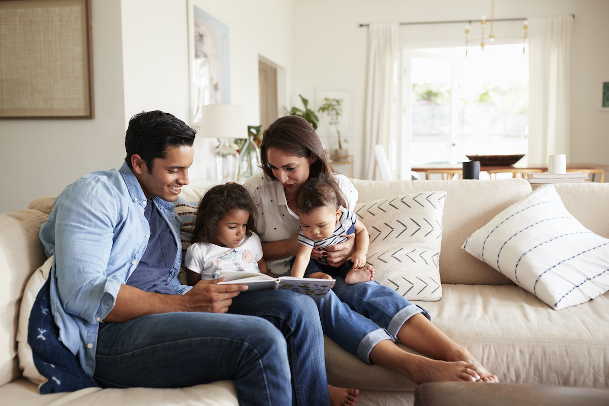 Family smiling at home