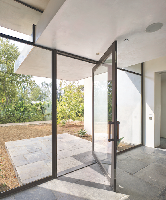 Hope's Windows' Jamestown175 pivot door is hurricane-rated