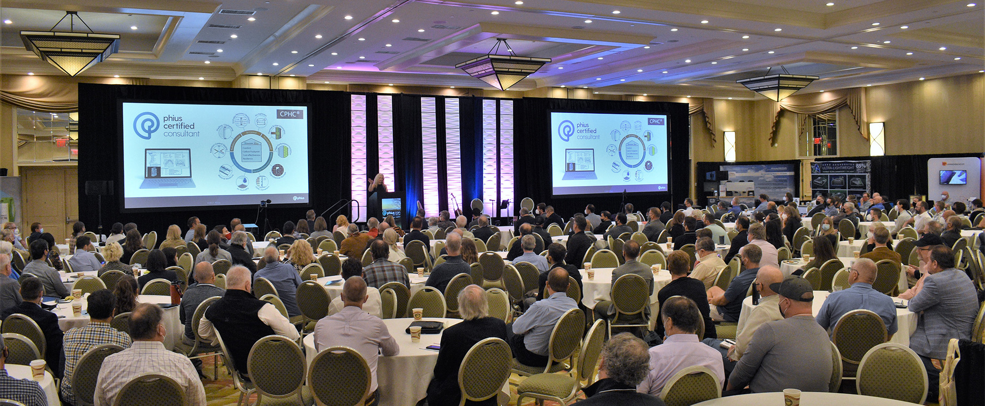 Conference room presentation with large croud