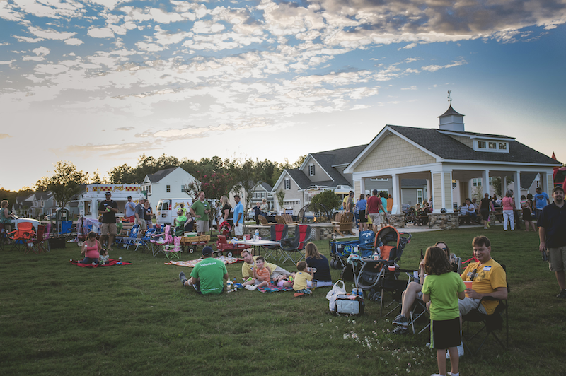 families socializing at Providence Pavilion master planned community event