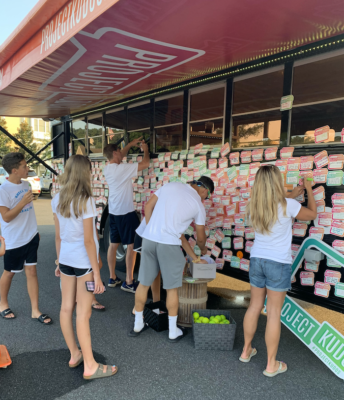 kids and adults post thank you notes for Schell Brothers' Project Kudos