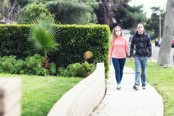 Couple Walking in suburbs