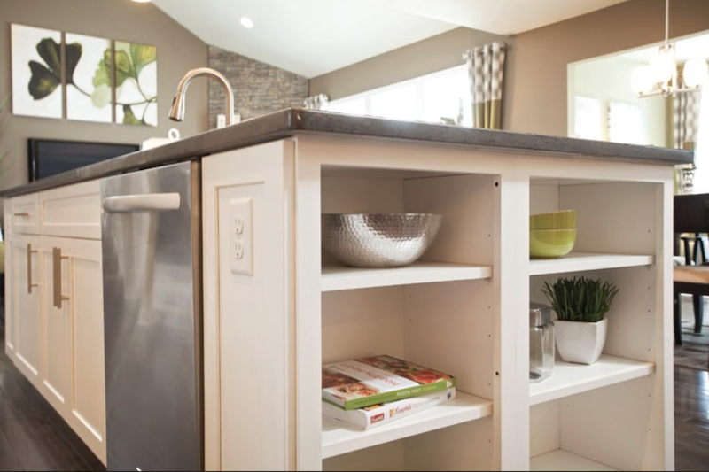 Open shelving in the kitchen contributes to a feeling of openness in this home by Pulte.