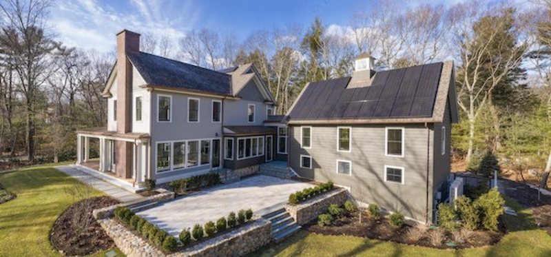 Rear exterior view of Green Phoenix Development's LEED Platinum farmhouse renovation