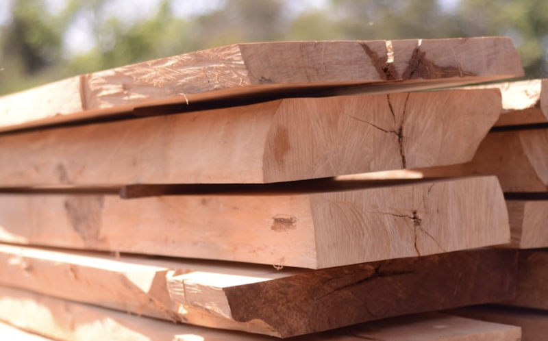 stacked lumber ready for home construction