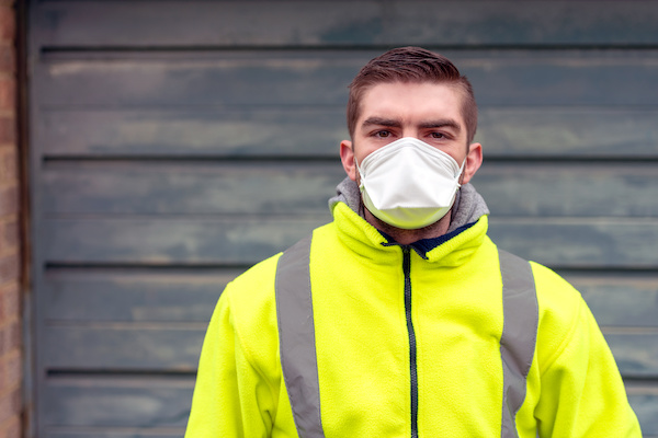 Young man with mask builder