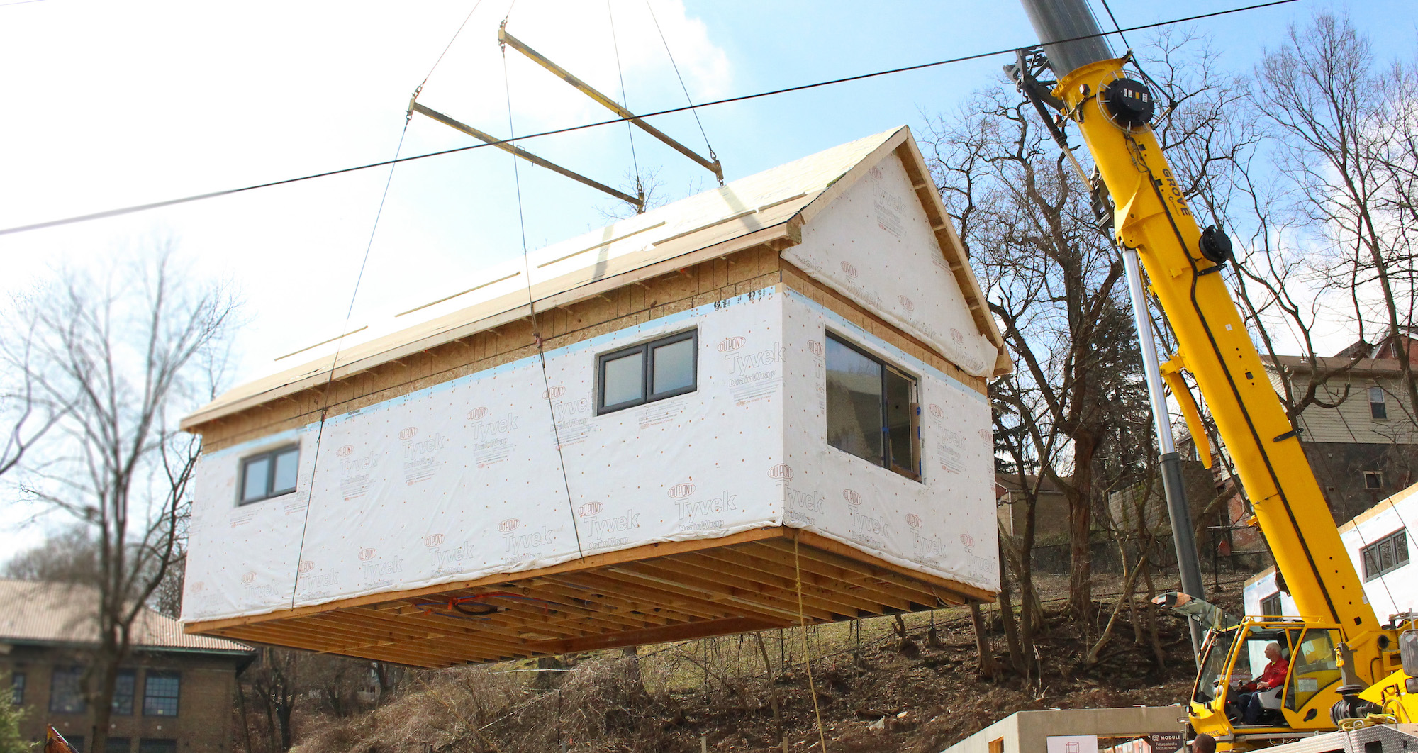 Modular unit lifted by crane for homebuilding