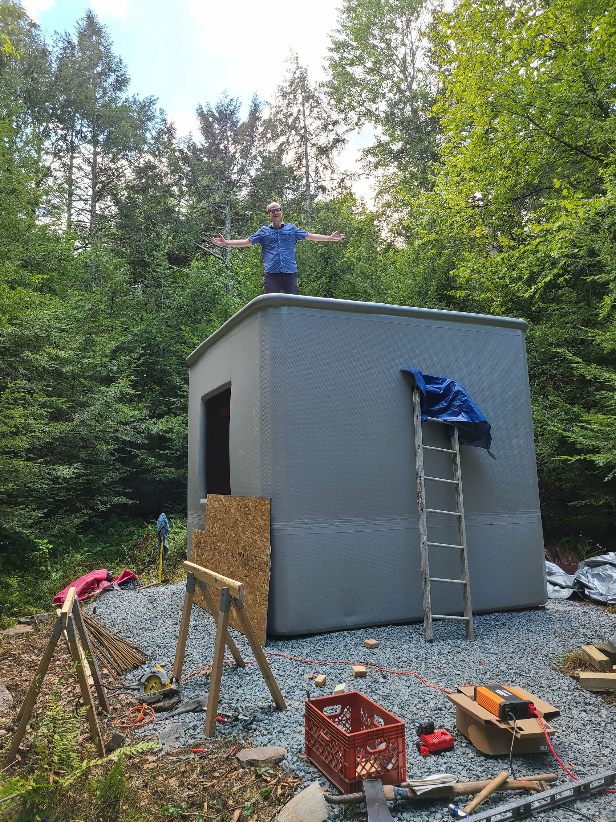 Inflatable house ADU with man on top