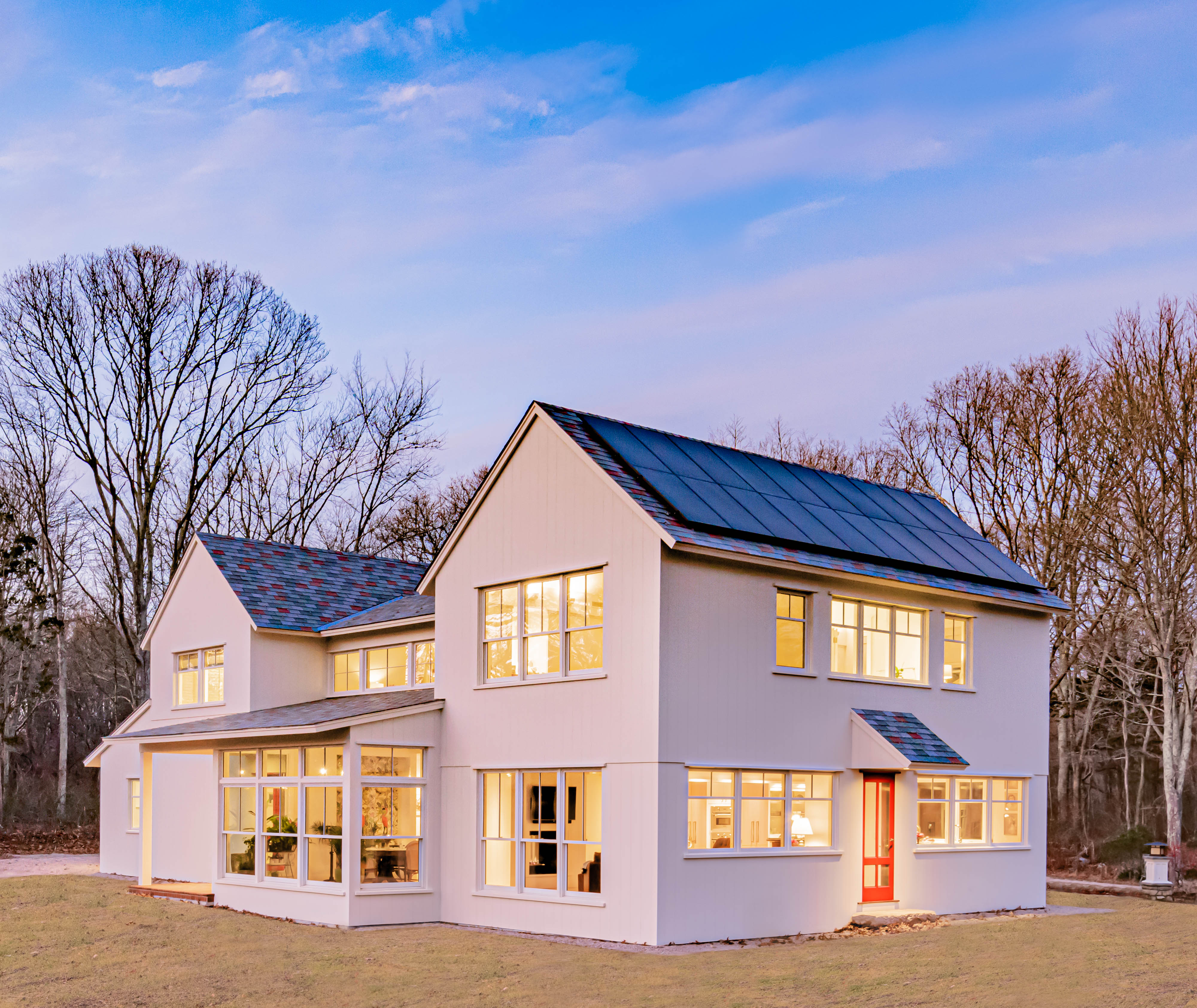 Clean lines and vertical TruExterior siding highlight this Modern Farmhouse designed by Michael McKinley and Associates, LLC. Photo: Jason McGrail 