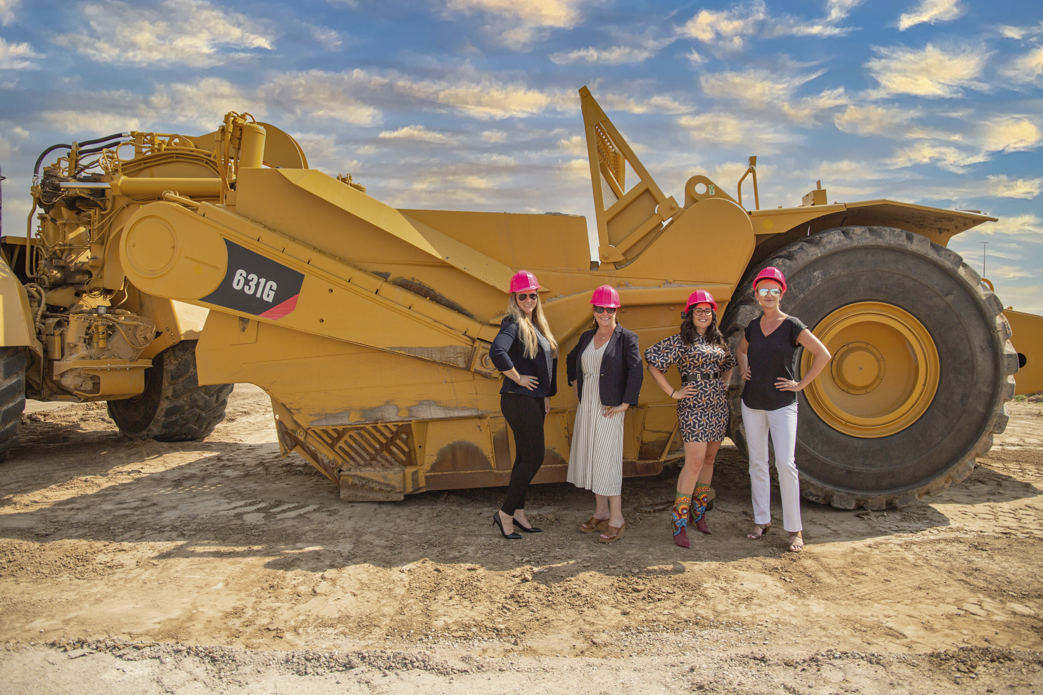 Carla Ferreira with mentors at Aurora Highlands development grounds