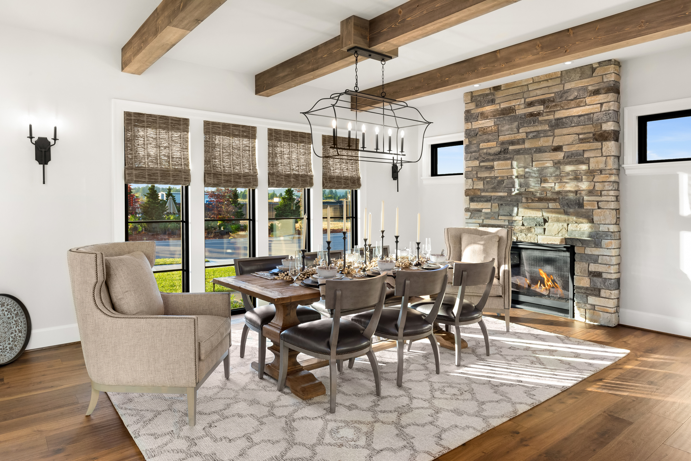 Elegant dining space with fireplace featuring Echo Ridge Country Ledgestone from Cultured Stone