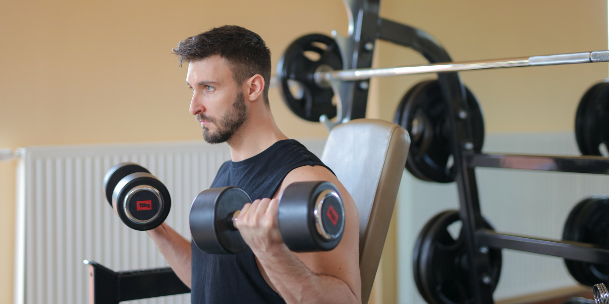 man exercising in home gym