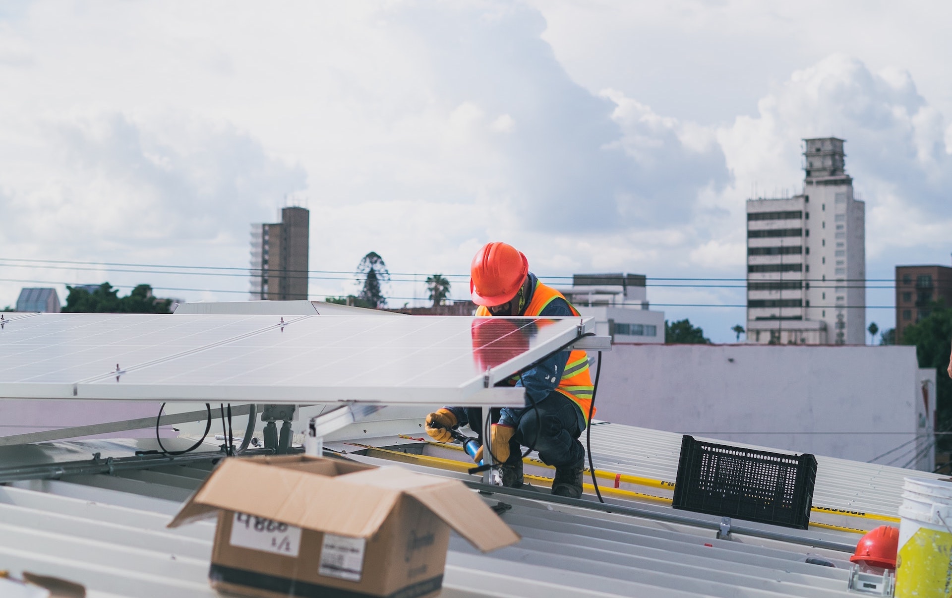 Solar Technician Installing Solar Panel