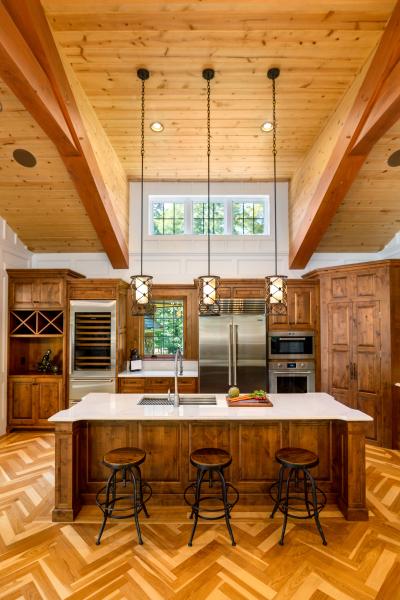 Herringbone wood beam frame kitchen