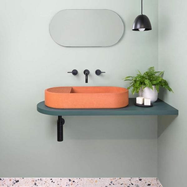 concrete orange bathroom sink