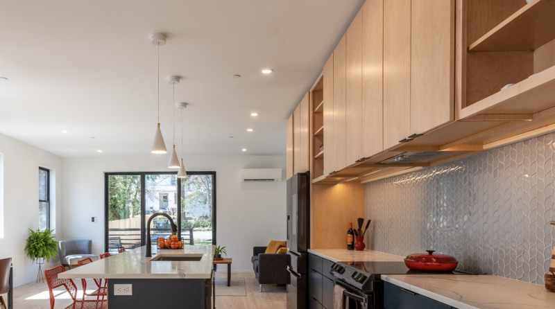 Photo of the completed SYMBI Duplex One Unit B kitchen featuring the Air King LE300A Power Pack exhaust hood.