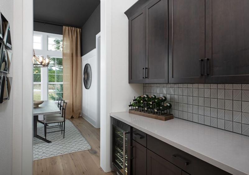 Kitchen and dining with dark gray walls