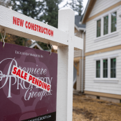 Newly built home for sale with sale pending sign out front