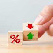 Red downward arrow indicates possible mortgage rate declines while green up arrow indicates increased home sales.