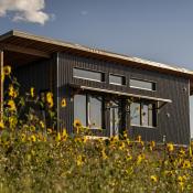 High-performance building envelope home with prefabricated panelized construction