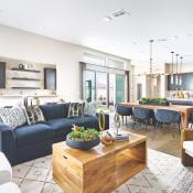 Living room with wet bar and outdoor living access