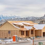 A single-family home under construction in Utah mountains