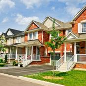 A row of red brick homes