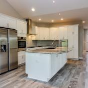 Pictured: A home by Addison Homes with a modern kitchen with Energy Star appliances