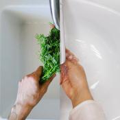 Split photo of man washing herbs in kitchen and woman washing hands in bathroom