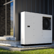 Heat pump installed next to outside wall new single-family home