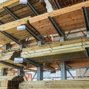 Lumber on shelves in warehouse