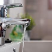 Water streaming from a bathroom faucet