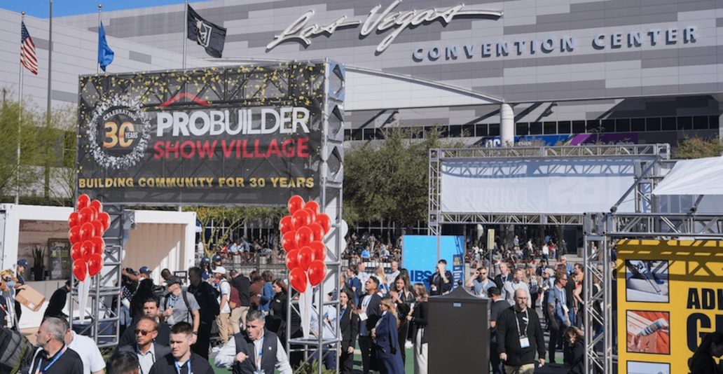 International Builders' Show floor with attendees and booths