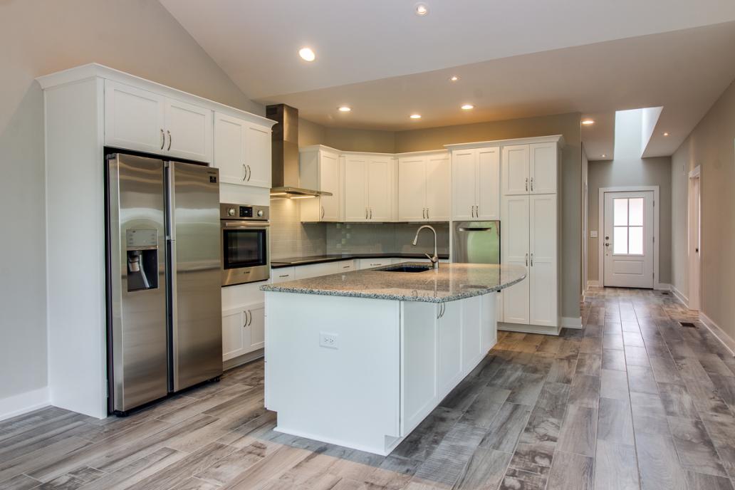 Pictured: A home by Addison Homes with a modern kitchen with Energy Star appliances