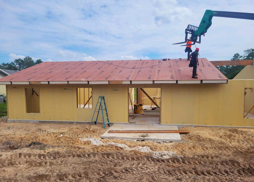 Installation of SIPanels at a Bettr Homes construction site