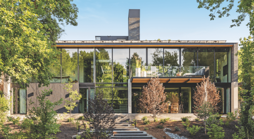 Glassy rear facade of the Burch Creek Home, a 2023 BALA winner 