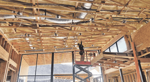 Insulation and HVAC being installed in The New American Home 2024, which achieves high performance scores for energy efficiency