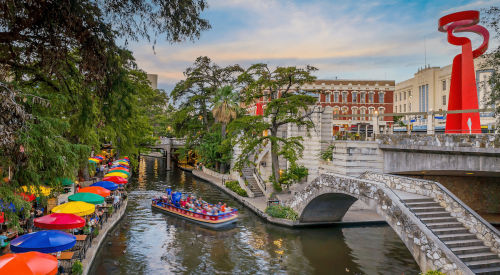 View of Austin, Texas, canal boat and city scene