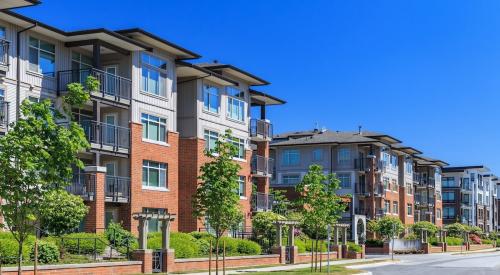 Exterior view of rental unit building amidst climbing rental prices