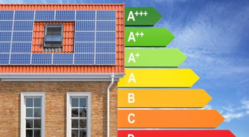 House with solar panels on roof and A through D energy rating scale alongside it