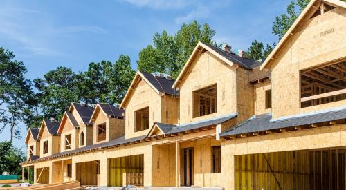 A row of townhomes under construction