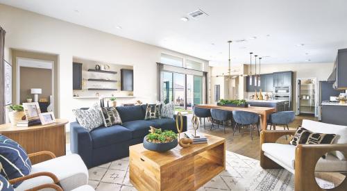 Living room with wet bar and outdoor living access