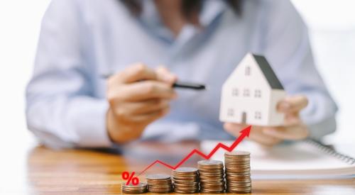 Home price increases represented by stack of coins increasing in value from left to right while man holds model house in background