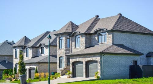 Row of luxury homes in a suburban neighborhood