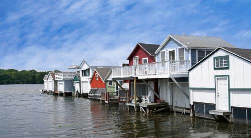 A row of house boats in the Finger Lakes region of New York