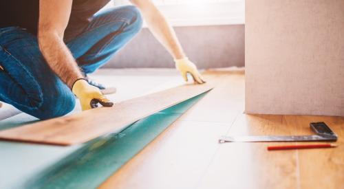 Homeowner lays new flooring